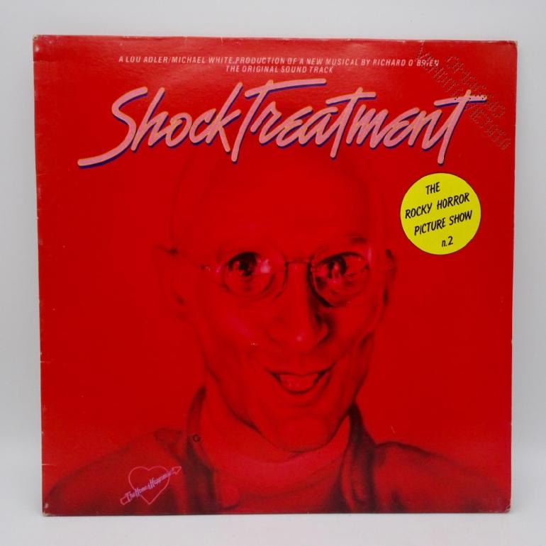 Shock Treatment  (Colonna sonora originale)  --  LP 33 rpm - Made in ITALY 1983 - WARNER BROS RECORDS - 56 957 - OPEN LP - PROMO COPY